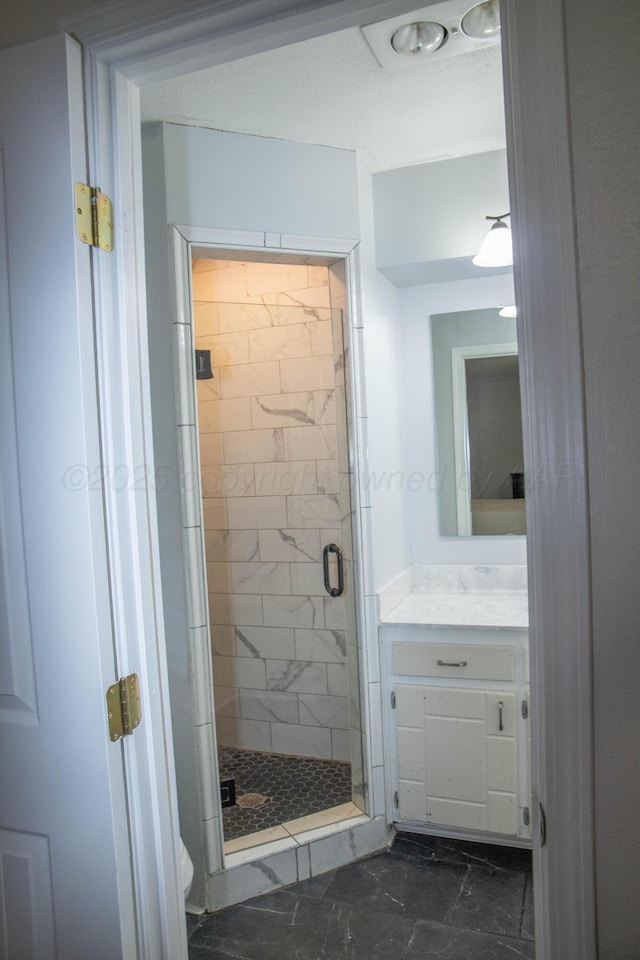 1403 Charles Ave, Panhandle, TX 79068 - full bath featuring marble finish floors, a stall shower, and vanity