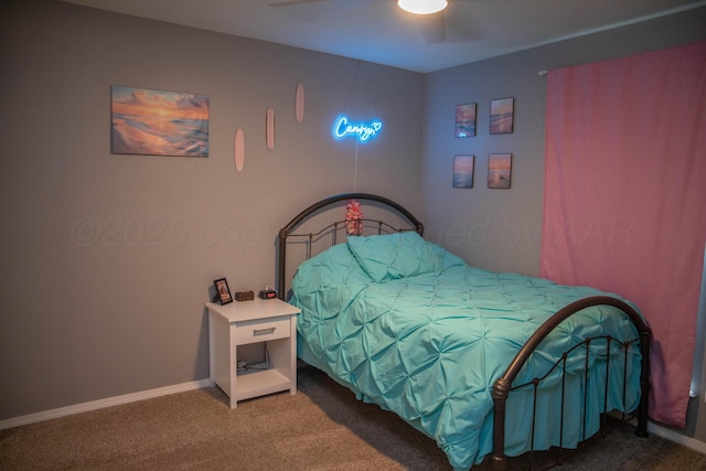 1403 Charles Ave, Panhandle, TX 79068 - carpeted bedroom featuring ceiling fan and baseboards