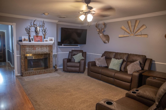 1403 Charles Ave, Panhandle, TX 79068 - living area with ornamental molding, ceiling fan, a fireplace, and wood finished floors