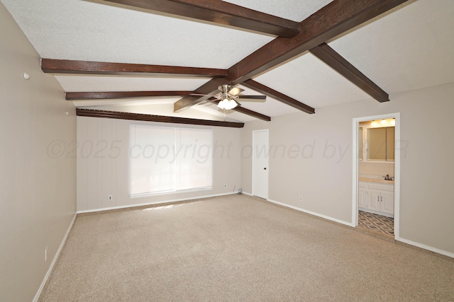 3519 Rutson Dr, Amarillo, TX 79109 - unfurnished bedroom featuring light carpet, baseboards, ceiling fan, and ensuite bathroom