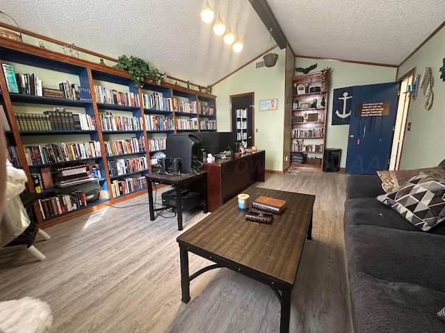 office area featuring vaulted ceiling, crown molding, hardwood / wood-style floors, and a textured ceiling