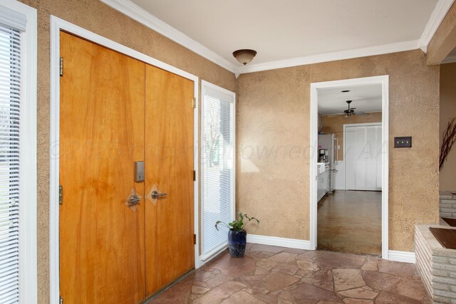 5506 Everett Ave, Amarillo, TX 79106 - foyer entrance with ceiling fan, crown molding, and stone finish floors