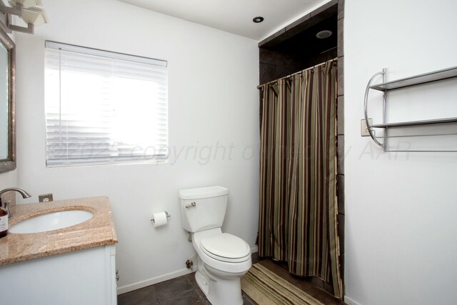 5506 Everett Ave, Amarillo, TX 79106 - full bath featuring vanity, a shower with shower curtain, and tile patterned flooring