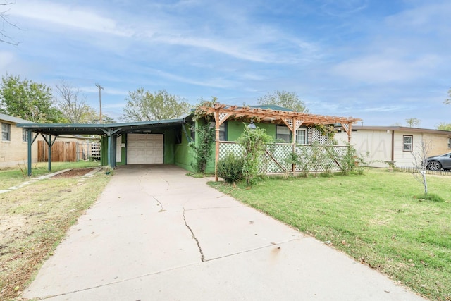 ranch-style home with a front yard and a carport