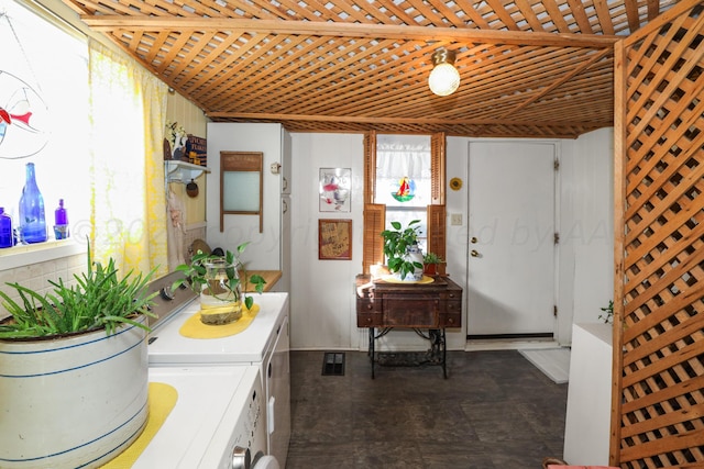 bathroom featuring washer and clothes dryer
