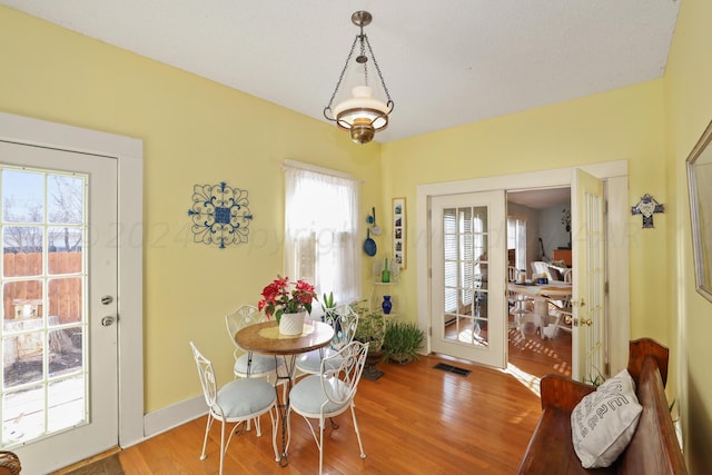 dining area featuring wood finished floors