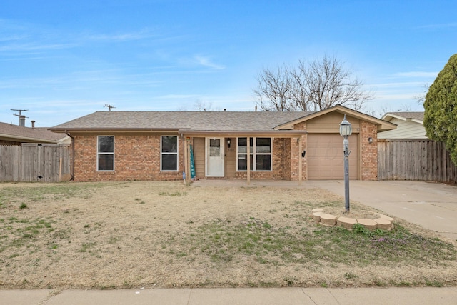 ranch-style house with brick siding, driveway, a garage, and fence