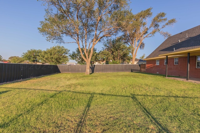 view of yard featuring a fenced backyard