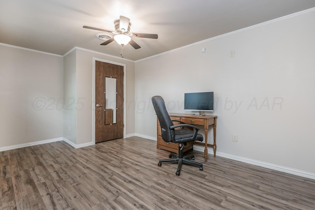 7216 Gainsborough Rd, Amarillo, TX 79106 - home office with wood finished floors, ceiling fan, baseboards, and crown molding