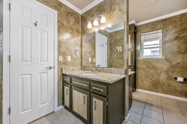 7216 Gainsborough Rd, Amarillo, TX 79106 - bathroom with crown molding, baseboards, tile patterned floors, and vanity