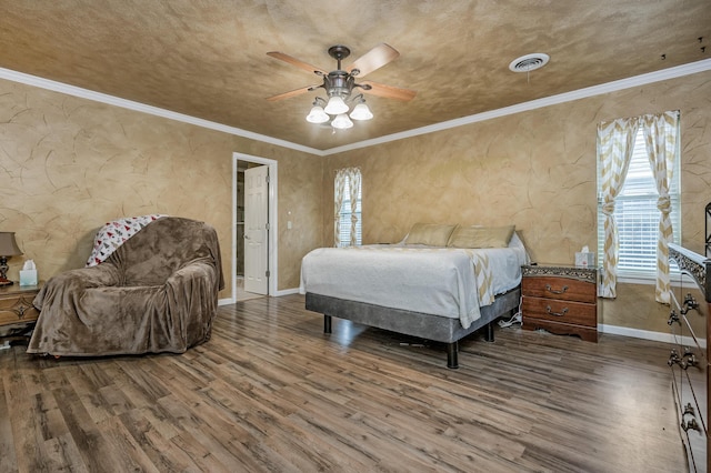 7216 Gainsborough Rd, Amarillo, TX 79106 - bedroom featuring wood finished floors, baseboards, ceiling fan, and crown molding