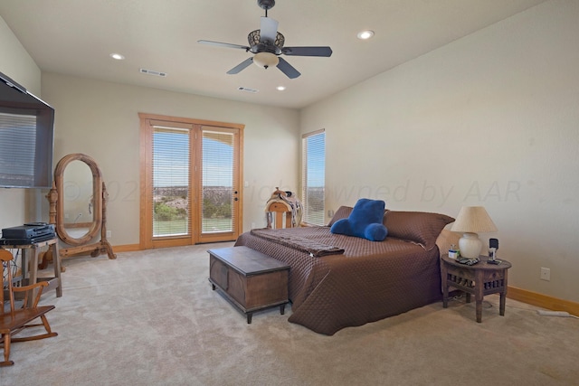 carpeted bedroom featuring access to outside and ceiling fan