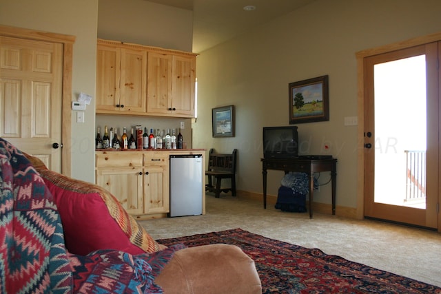 living room with light colored carpet and bar