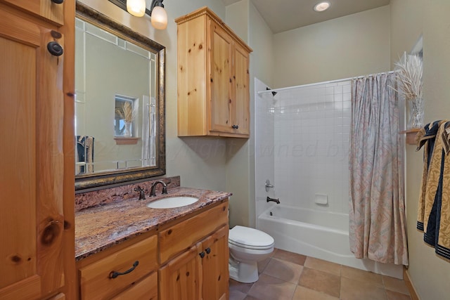 full bathroom with tile patterned flooring, shower / bath combo, toilet, and vanity