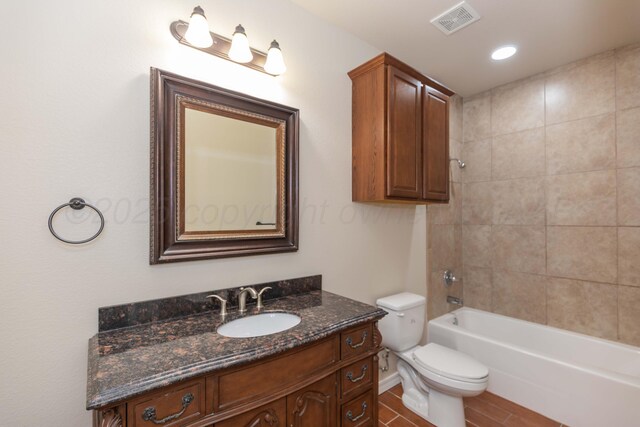7111 Mosley St, Amarillo, TX 79119 - full bathroom featuring toilet, visible vents, shower / tub combination, and vanity