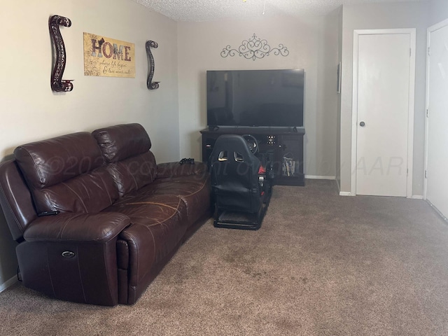 carpeted living room featuring a textured ceiling