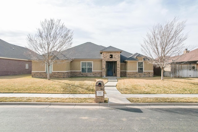 view of front of house with a front yard