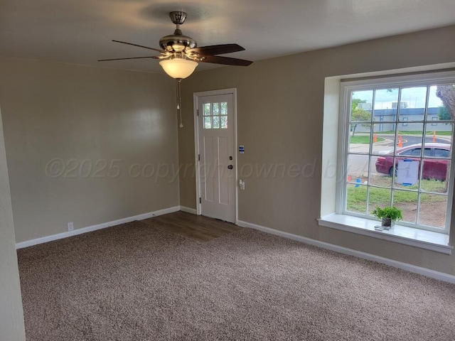 1020 N Nelson St, Amarillo, TX 79107 - foyer entrance with carpet floors, baseboards, and a ceiling fan