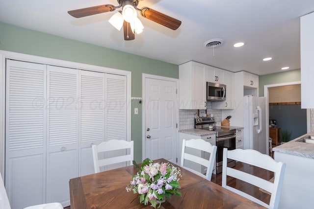 dining room with recessed lighting and ceiling fan