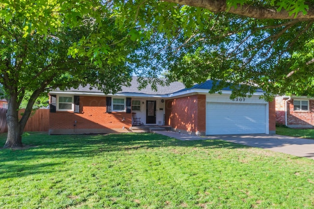 ranch-style house with an attached garage, brick siding, and concrete driveway