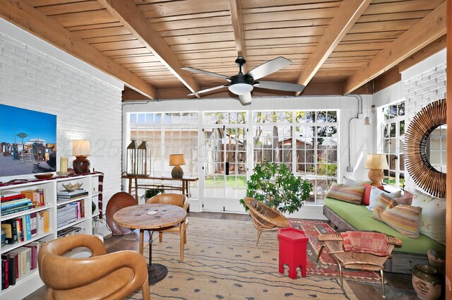 2215 S Hughes St, Amarillo, TX 79109 - sunroom featuring a ceiling fan and beamed ceiling