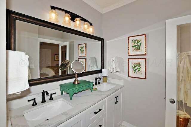 2215 S Hughes St, Amarillo, TX 79109 - ensuite bathroom with ornamental molding and double vanity