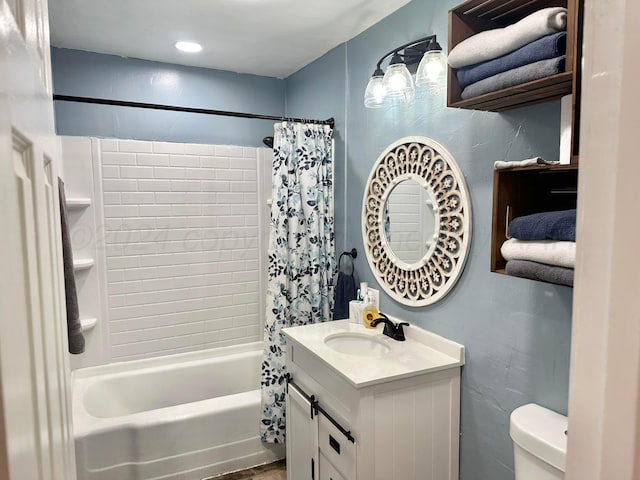 full bathroom with shower / bath combo, toilet, and vanity