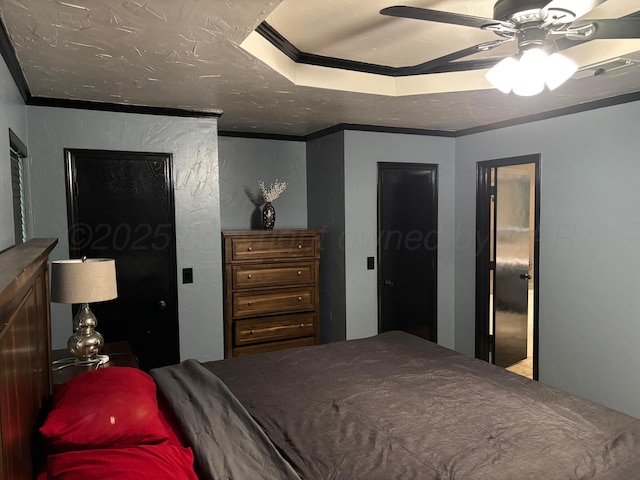 7810 Farrell Dr, Amarillo, TX 79121 - bedroom featuring a tray ceiling, crown molding, and ceiling fan