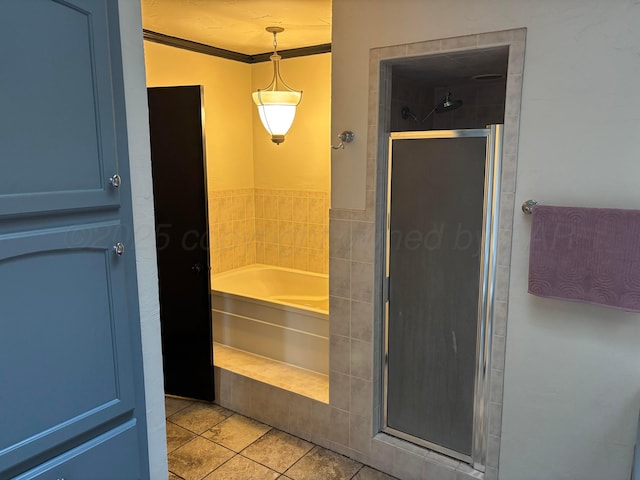 7810 Farrell Dr, Amarillo, TX 79121 - full bathroom featuring a garden tub, a shower stall, tile patterned flooring, and ornamental molding