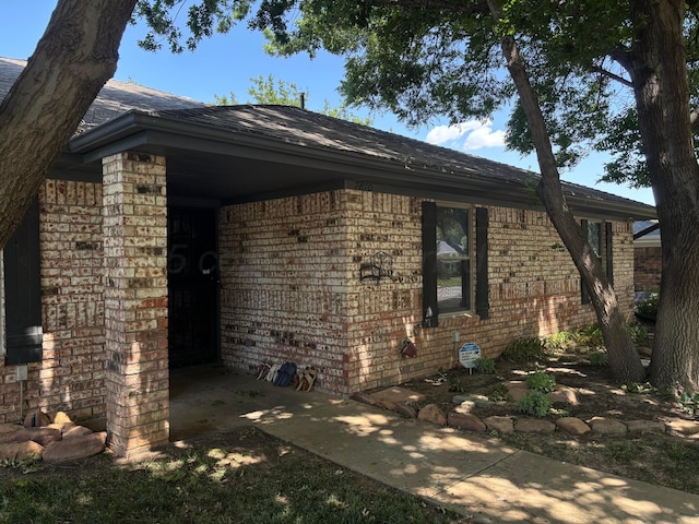 7810 Farrell Dr, Amarillo, TX 79121 - view of side of home with brick siding