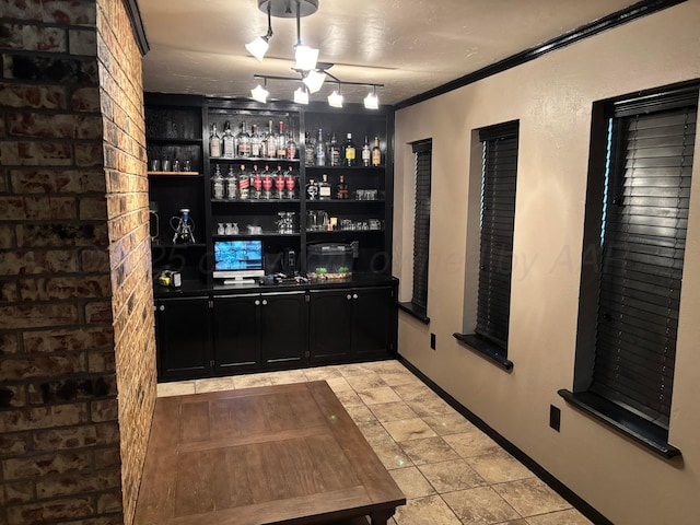 7810 Farrell Dr, Amarillo, TX 79121 - wine room featuring a dry bar and ornamental molding