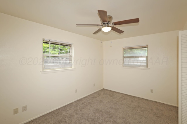 5505 SW 34th Ave, Amarillo, TX 79109 - unfurnished room featuring carpet flooring, ceiling fan, and baseboards