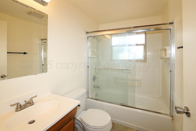 5505 SW 34th Ave, Amarillo, TX 79109 - bathroom with toilet, vanity, and combined bath / shower with glass door