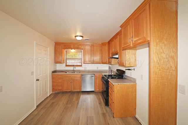 5505 SW 34th Ave, Amarillo, TX 79109 - kitchen featuring dishwasher, black gas range oven, a sink, light wood-style flooring, and light countertops