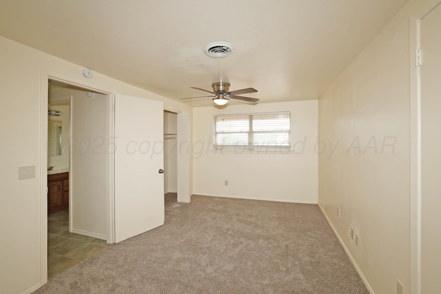5505 SW 34th Ave, Amarillo, TX 79109 - unfurnished bedroom featuring carpet flooring, a closet, and a ceiling fan