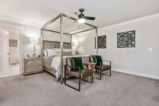 carpeted bedroom with ceiling fan, ornamental molding, and connected bathroom