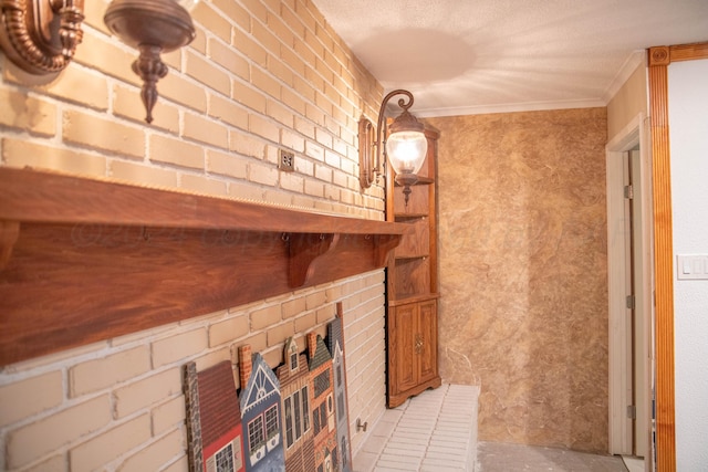 interior space with a fireplace and crown molding