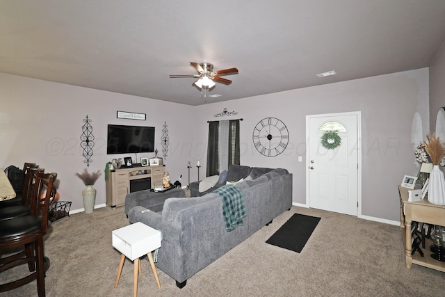 4908 Gloster St, Amarillo, TX 79118 - living area featuring a ceiling fan, carpet, and baseboards