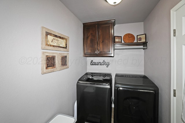 4908 Gloster St, Amarillo, TX 79118 - washroom featuring cabinet space and washer and dryer