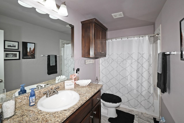 4908 Gloster St, Amarillo, TX 79118 - bathroom featuring toilet, vanity, and shower / bath combination with curtain