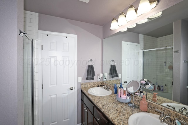 4908 Gloster St, Amarillo, TX 79118 - bathroom with a shower stall and double vanity