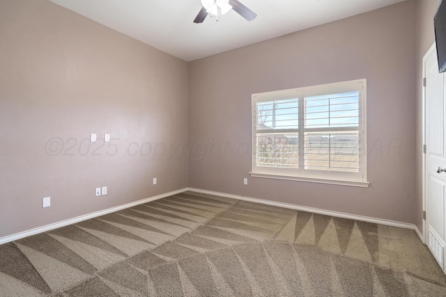 unfurnished room with baseboards, carpet, and a ceiling fan