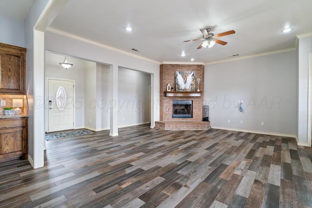 unfurnished living room featuring visible vents, baseboards, dark wood-style floors, and a ceiling fan