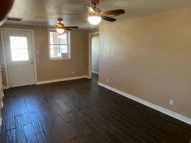 3601 NE 13th Ave, Amarillo, TX 79107 - unfurnished living room with a ceiling fan and dark wood-style flooring