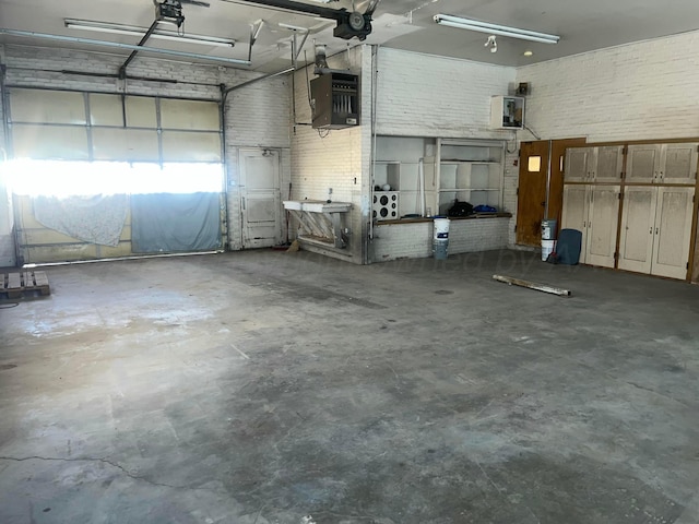 3601 NE 13th Ave, Amarillo, TX 79107 - garage with a heating unit and a garage door opener