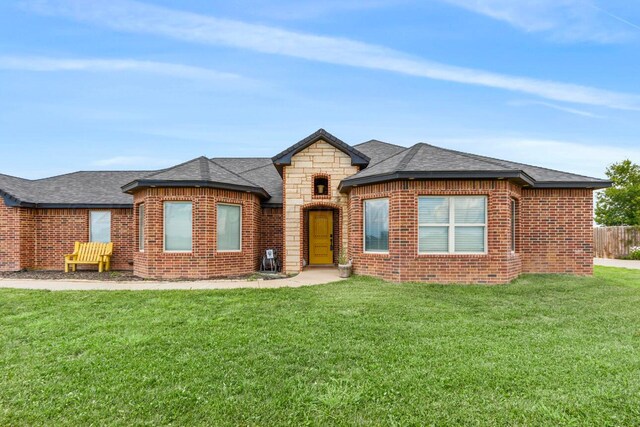 view of front of house with a front lawn