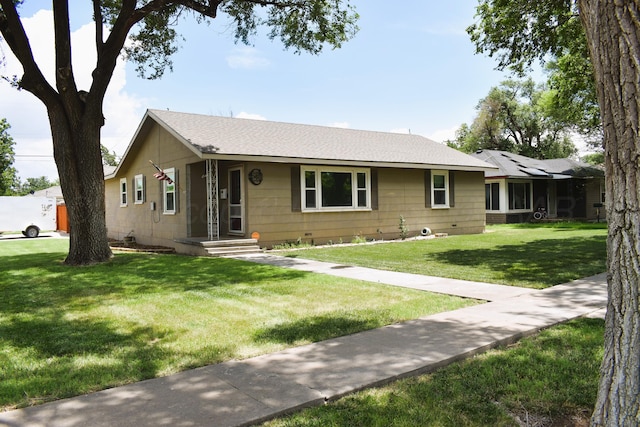 501 Bruce Ave, Dumas, TX 79029 - single story home with crawl space, a front yard, and a shingled roof