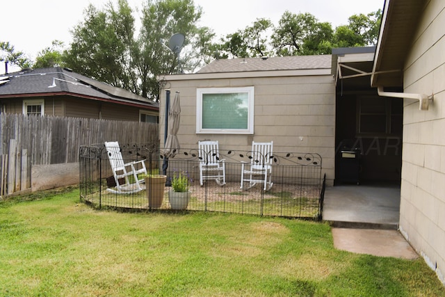 501 Bruce Ave, Dumas, TX 79029 - view of yard featuring a patio