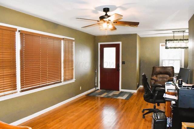 501 Bruce Ave, Dumas, TX 79029 - entryway featuring a ceiling fan and wood finished floors