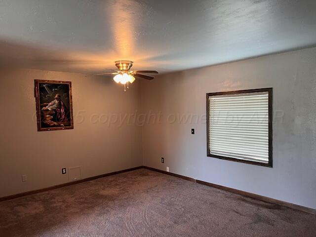 204 SE 15th Ave, Perryton, TX 79070 - carpeted spare room featuring ceiling fan and baseboards